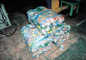 Plastic bottle compression molded article